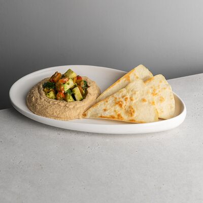 Хумус с пряными овощами в Великие по цене 780 ₽