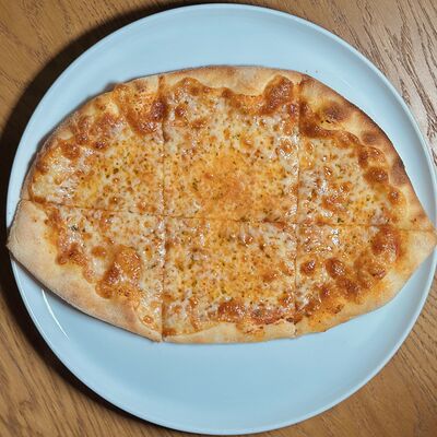 Мини-пицца Маргарита в Романовская пекарня по цене 540 ₽