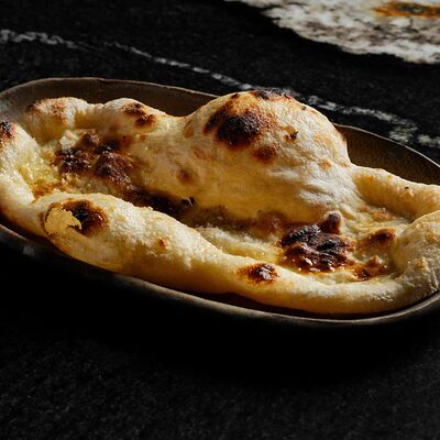 Лепёшка из дровяной печив Maya по цене 290 ₽