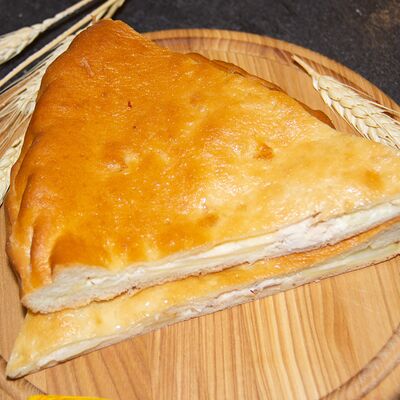 Пицца Деревенская слайс в Хлеборезов по цене 100 ₽