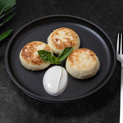 Сырники со сметаной в In Tasty по цене 380 ₽