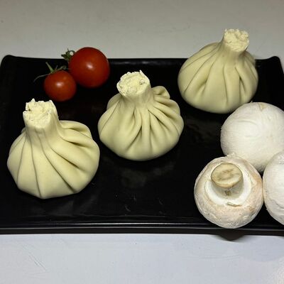 Хинкали с грибами в Гостиный дворик по цене 330 ₽