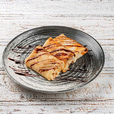 Блины с шоколадным кремом и бананом в Coffee muse по цене 365 ₽