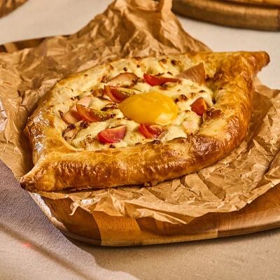 Фирменное аджарское хачапури в Месхети по цене 990 ₽