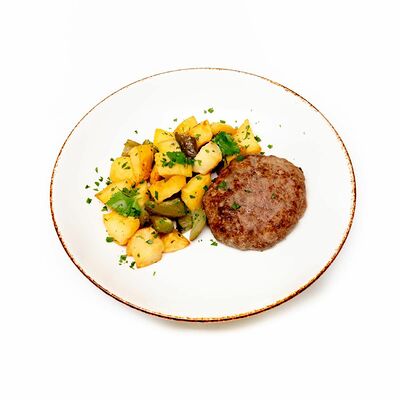Мясная котлета с печеным картофелем в Гриль house по цене 375 ₽