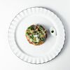 Картофельный драник с копчёной уткой и пармезаном в МОМО по цене 900