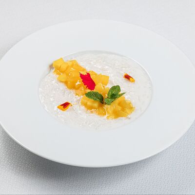 Каша рисовая на кокосовых сливках с дольками спелого манго в Sabor de la Vida по цене 680 ₽