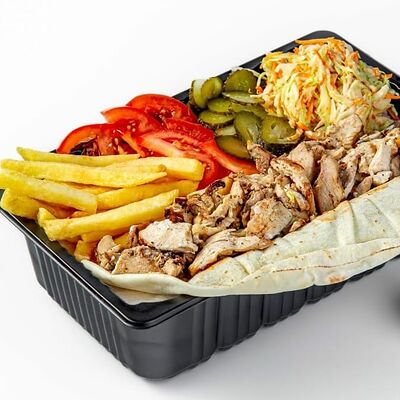 Куриная шаурма на тарелке в Шаурма Дамаск по цене 900 ₽