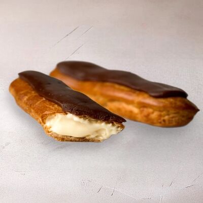 Эклер ванильныйв Шоколадница по цене 280 ₽