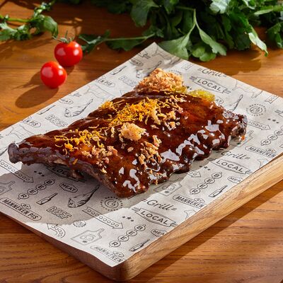 Свиные рёбрышки в соусе апельсиновый Джек Дениэлс в Munhell по цене 1070 ₽