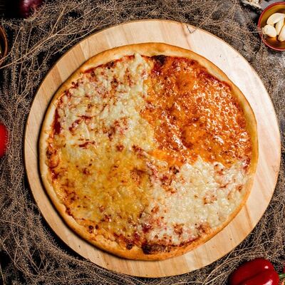 Четыре сыра в Пицца стучится по цене 1250 ₽