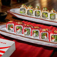 Логотип Тануки