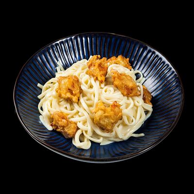 Удон с хрустящей курочкой в сырном соусе в Wokmania по цене 421 ₽