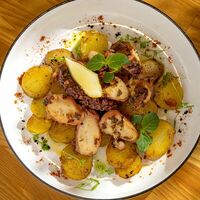 Осьминог по-галисийски в True Crab