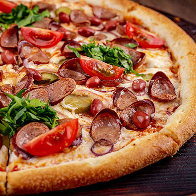 С колбасками и фасолью в Пицца Хаб по цене 792 ₽
