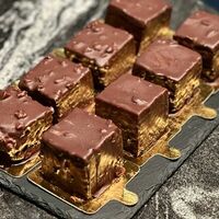 Птичье молоко в темном шоколаде с арахисом в Premium bakery Andre