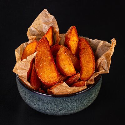 Картофельные дольки в MOS Lounge & Bar по цене 280 ₽