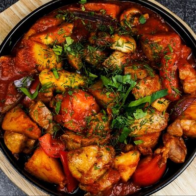 Горячая сковородка со свининой в Dimcoffee по цене 660 ₽