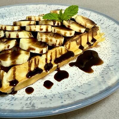 Вафля с Нутеллой и бананом в Оазис кафе по цене 420 ₽