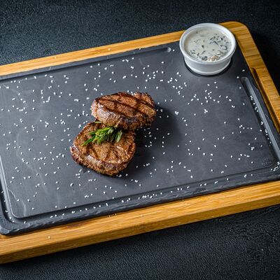 Медальоны из телятины в Florentini City Café по цене 1350 ₽