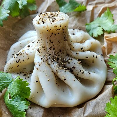 Хинкали с говядиной отварные в Сытый Гусь по цене 145 ₽