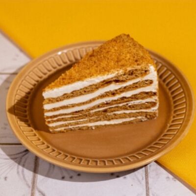 Пирожное-торт Медово-сливочный в Буханка по цене 329 ₽