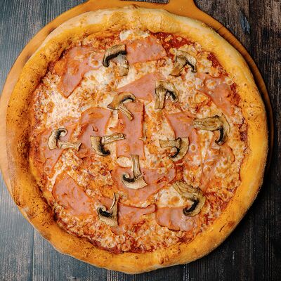 Пицца с ветчиной и грибами в Вкус кафе по цене 920 ₽