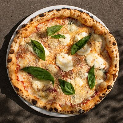 Пицца Четыре сыра в Bshushu по цене 1650 ₽