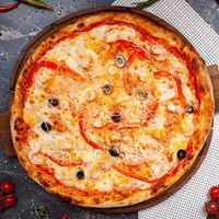 Пицца с королевскими креветками в La Pizza Bomba на дровах