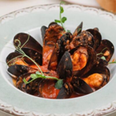 Мидии в томатном соусе с итальянскими травами в Паста Фэмили по цене 770 ₽