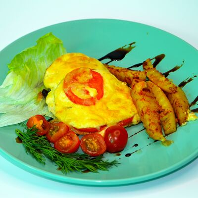 Куриная отбивная с помидорами и сыром в У Сватов по цене 380 ₽