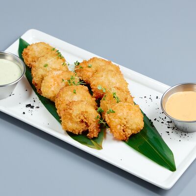 Жареные креветки в панировке с соусами спайси и тар-тар в Stella Lounge по цене 38 р.