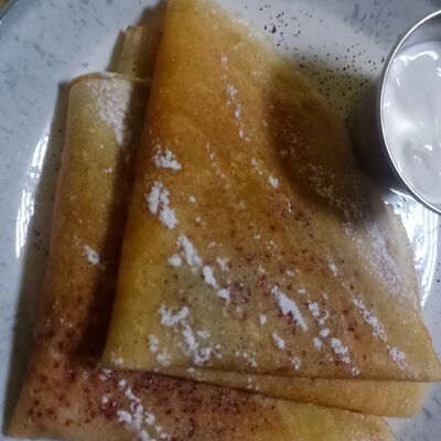 Блинчики с домашним вареньем и сметаной в Oasis по цене 210 ₽