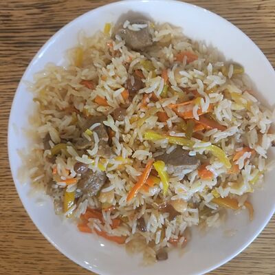 Плов с говядиной в Чайхана Уют Халяль по цене 473 ₽