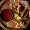 Картофель по-деревенски с имеретинским сыром и перечным соусом в Кочевники по цене 690