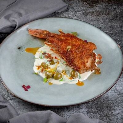 Морской окунь с оливками и тосканским соусом в Duran Bar & Grill по цене 559