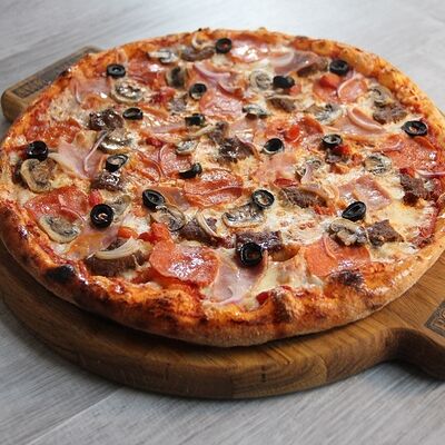 Пицца Суприм в Pomidoroff по цене 1220 ₽