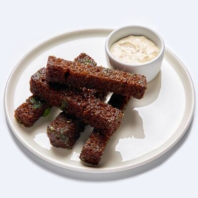 Гренки чесночные с соусом Тартар в Drunken duck pub по цене 430 ₽