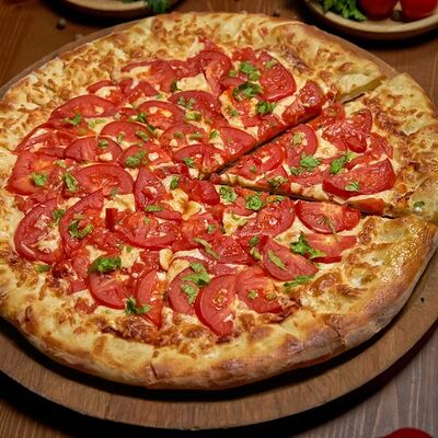 Пицца Маргарита в The Кухня по цене 900 ₽