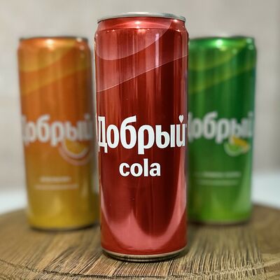Добрый Cola 330мл в ГансРолл по цене 215 ₽