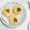 Манты с куриной ножкой, картофелем и сыром в Зефир по цене 450
