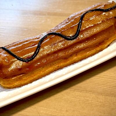 Эклер кофейный в Park cafe по цене 180 ₽