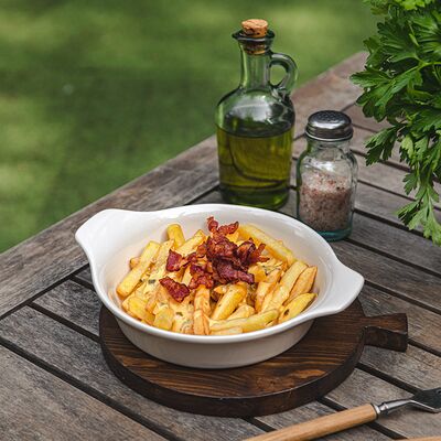 Картофель фри с сыром и беконом в Эка по цене 380 ₽