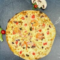 Пицца с морепродуктами и королевскими креветками в FRESH PIZZA