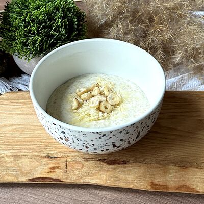 Каша овсяная с фундуком и пармезаном в Про Булки кафе-пекарня по цене 230 ₽