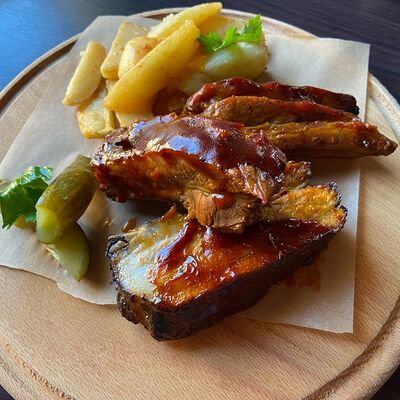 Свиные ребрышки Барбекю в Первая реберная Кухня по цене 650 ₽