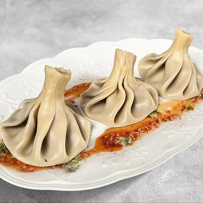 Хинкали том-ям в MaMa Mia по цене 310 ₽