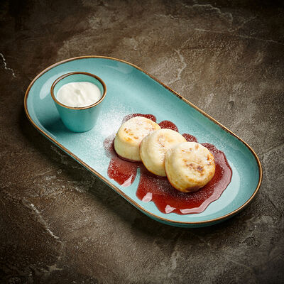 Сырники со сметаной в Корчма по цене 490 ₽