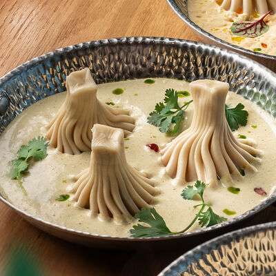 Хинкали с соусом чкмерули в ЮжанеГорожане по цене 578 ₽