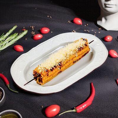 Кукуруза на гриле с пармезаном в Ребро по цене 1390 ₸